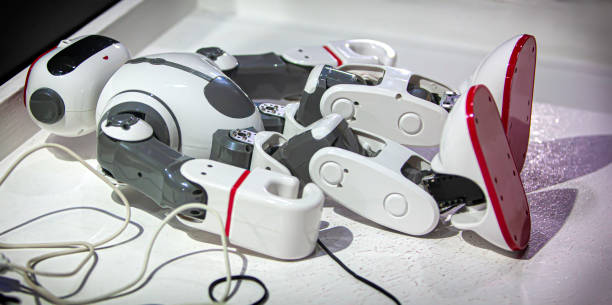 istock model robot is lying on the table at the exhibition. Selctive focus 1437473675