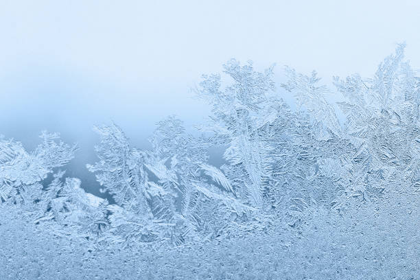istock Frosty pattern on the window glass.  Abstract, background 1437473730