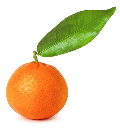 A whole orange with a leaf on top, isolated on a white background