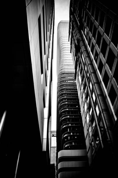 istock Low angle vertical grayscale shot of skyscrapers in Abu Dhabi, UAE 1437479462