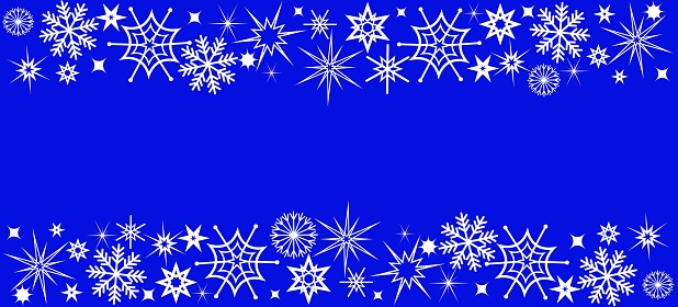 White snowflakes top and bottom on a blue background. Concept of christmas, new year