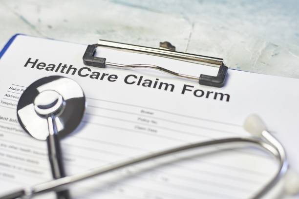 istock Healthcare claim form and a stethoscope 1437481498