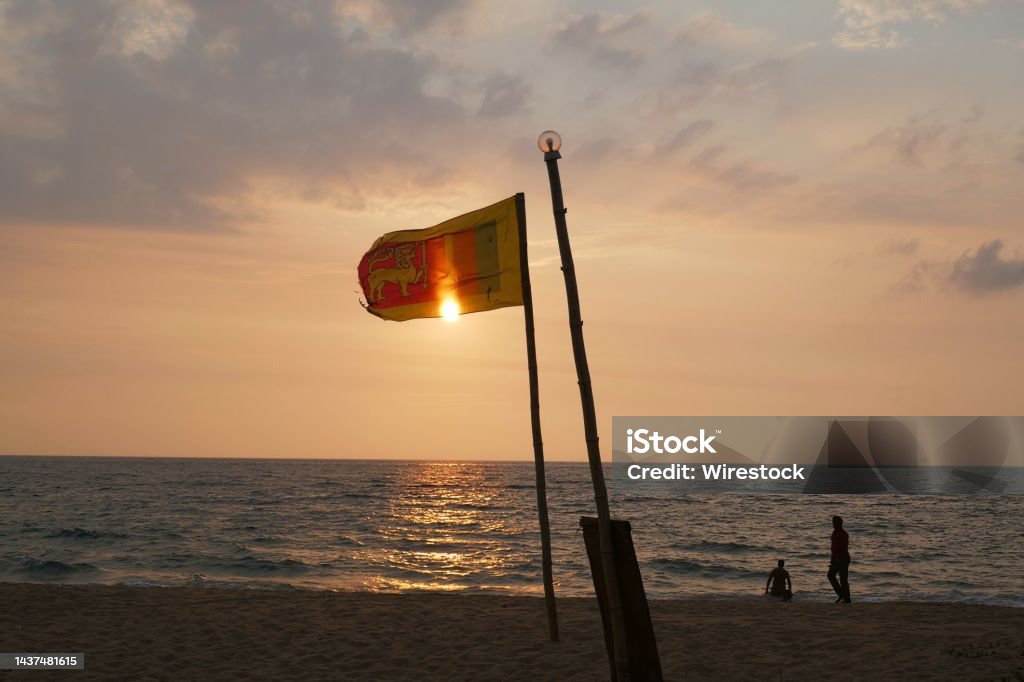 Beautiful sunset on a beach in Colombo, capital of crisis-ridden Sri Lanka. The government blamed the Covid pandemic, which badly affected Sri Lanka's tourist trade - one of its biggest foreign currency earners. Economy Stock Photo