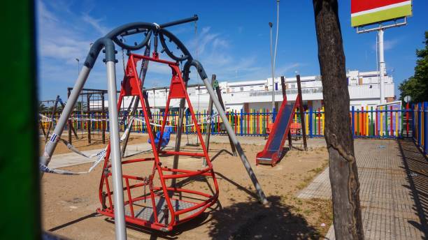 istock Colorful kids playground with slider and swing 1437484280