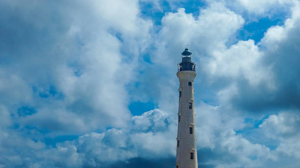 istock Lighthouse Tropical Exotic Location Sky Caribbean Island Aruba 1437488134