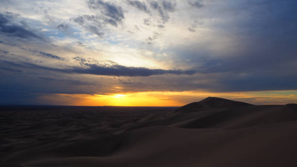 istock Sunset sky over Gobi desert dunes in Mongolia 1437488303