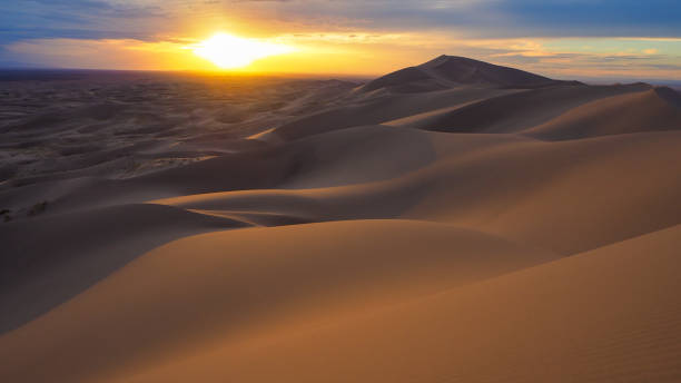 istock Sunset sky over Gobi desert dunes in Mongolia 1437488316