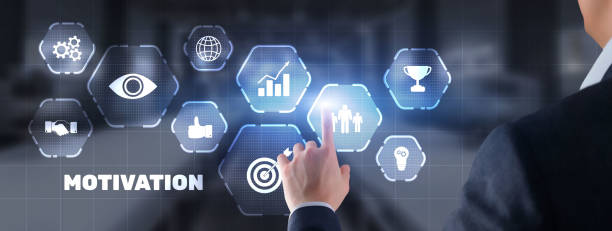 istock Motivation concept. Man in a jacket clicks on a virtual screen inscription Motivation 1437489236