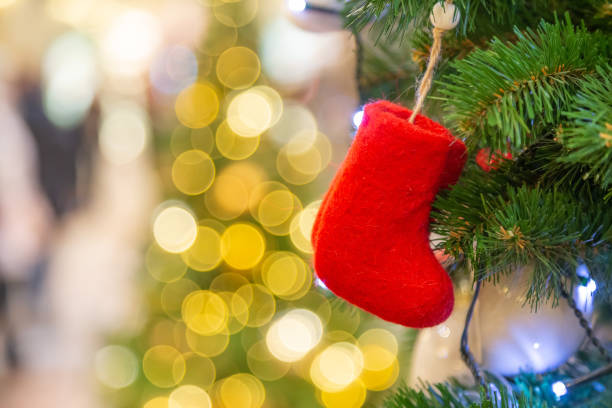 istock Decorated Christmas tree on defocused dreamy bokeh background 1437489373