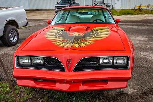 Des Moines, IA - July 01, 2022: High perspective front view of a 1978 Pontiac Firebird Trans Am at a local car show.