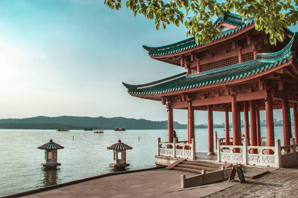 Xiying Pavilion and West Lake in sunny day. Xiying Pavilion and West Lake in sunny day. Xiying Pavilion is a popular scenic spot to view Leifeng Pagoda standing in the sunset west lake stock pictures, royalty-free photos & images