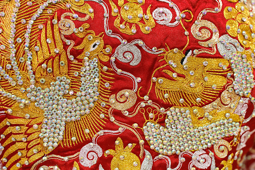 Traditional Chinese bride's wedding dress details close up