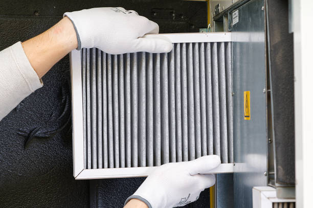 istock Replacing filter in the central ventilation system. hvac filter replacing home central air system 1437496304