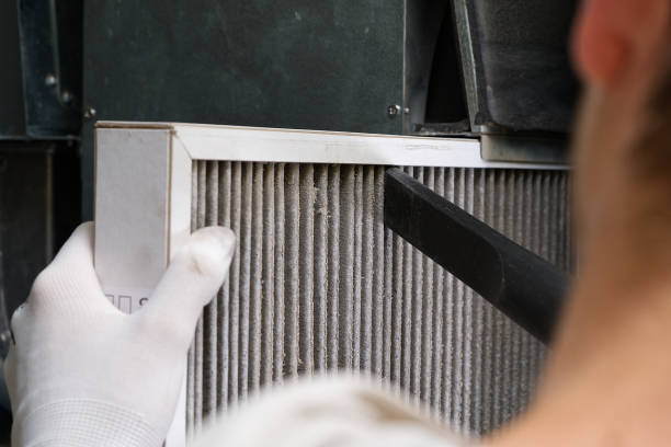 istock Replacing filter in the central ventilation system. hvac filter replacing home central air system 1437497699