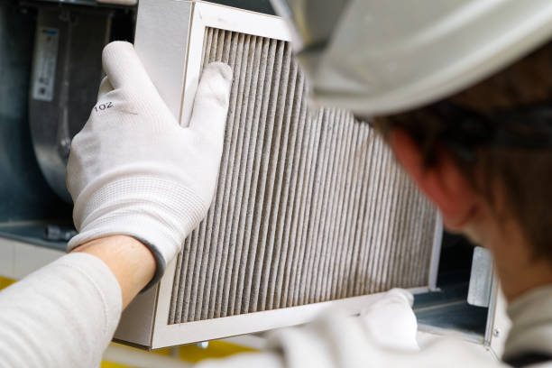 istock Replacing filter in the central ventilation system. hvac filter replacing home central air system 1437499025
