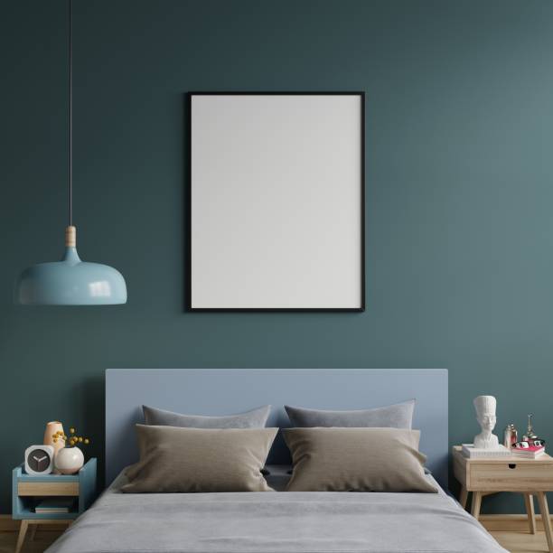 istock Poster mockup with vertical frames on empty dark green wall in bedroom interior. 1437501501