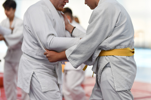 Gripping Techniques By Judo Players During Class