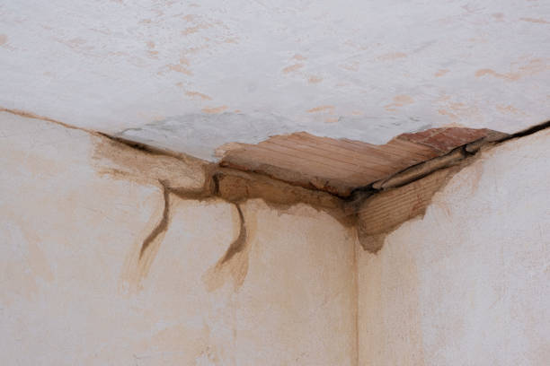 Interior prepared for reconstruction on Ruined old wall corner. Working Fixing Repair Aged Architecture. Retro design.