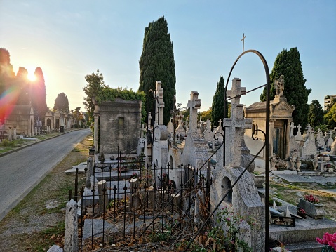 The Cimetière Saint-Pierre (Marseille) is the largest cemetery in the city of Marseille. It was established on 25 September 1855. The image shows the cemetery and several graves captured during autumn season.