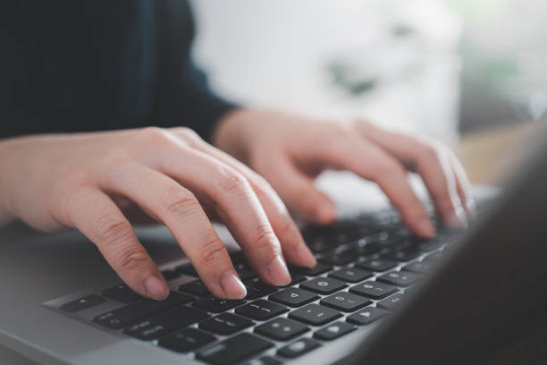 istock Business concept. Woman using laptop to work on office desk. 1437508141
