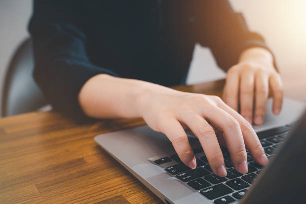 istock Business concept. Woman using laptop to work on office desk. 1437508149