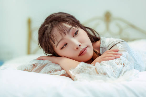 istock A woman relaxing in her bedroom 1437509189