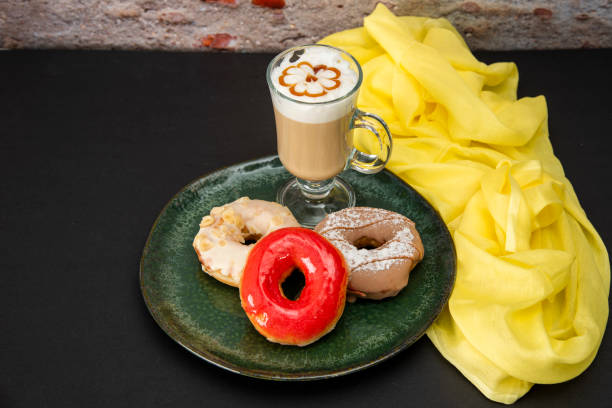 istock Colorful Sweet Donuts and coffee 1437513040
