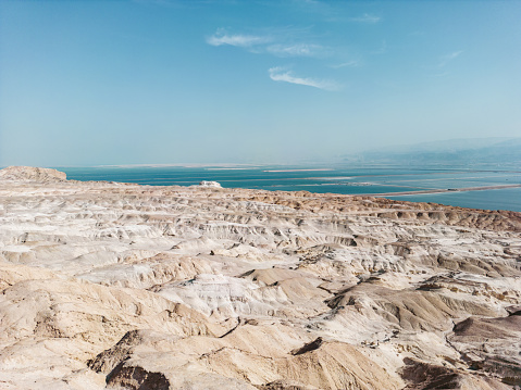 Dead Sea landscape in Israel. Harsh landscape view of coastal area of the water form during the day.