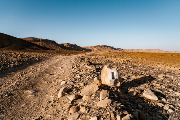 Road marking in Desert Landscape in Middle East stock photo