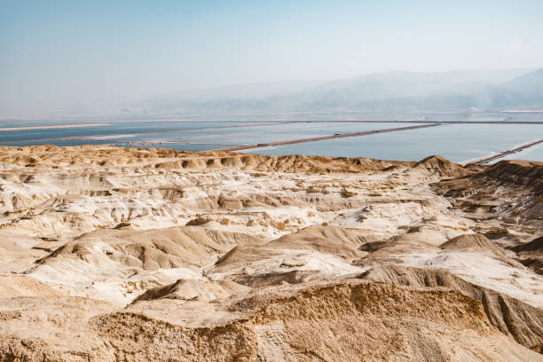 Dead Sea landscape in Israel. Harsh landscape view of coastal area of the water form during the day.