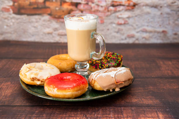 istock Colorful Sweet Donuts and coffee 1437514340