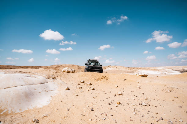 istock Small SUV in Desert Landscape in Middle East 1437515157
