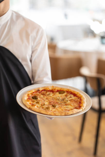 istock restaurant pizza and white table, Delicious pizza with mozarella and tomatoes 1437516089