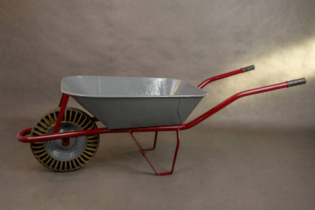 istock Painted wheelbarrow on a concrete tiles 1437516164