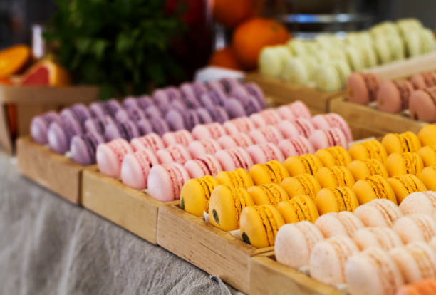 istock Colorful macarons in a rows in the wooden boxes 1437516261