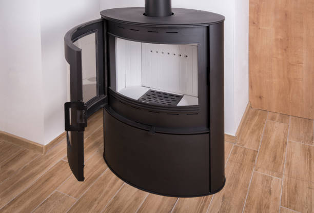 istock New black iron Wood Burning Stove on a ceramic tiles floor 1437516998