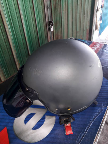 istock helmet in black color 1437518262