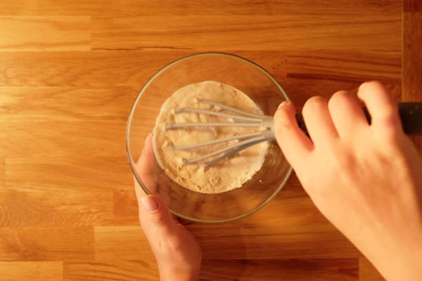 istock the process of making buns. flour . eggs . chocolate. tremble. dough milk . salt . 1437518497