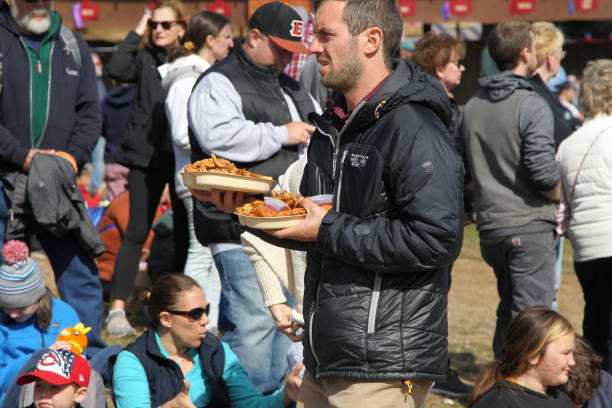 Man bought fried food for lunch The Sandwich Fair Held annually at Sandwich, NH, US on Columbus Day Weekends, October 8 - 10, 2022. The Grand Street Parade. sandwich new hampshire stock pictures, royalty-free photos & images