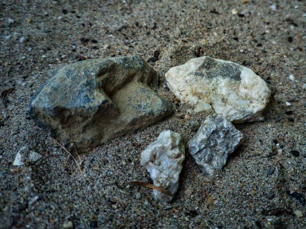 istock The four stones in the sandbox 1437524381