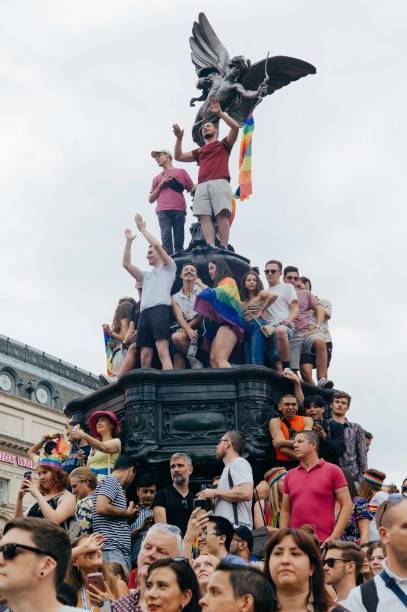 London Pride Parade London, United Kingdom – July 06, 2019: United Kingdom, July 2019, London. Participants gather for the London Gay Pride Parade 2019, descending the busy Regent Street. itv photos stock pictures, royalty-free photos & images