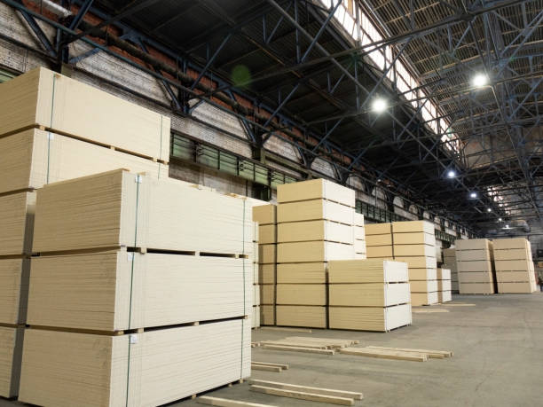 istock A lumber warehouse located in a stack. Industrial wood 1437527156