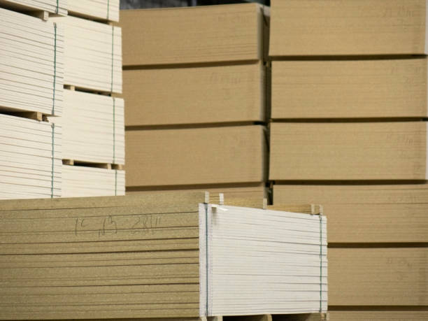A lumber warehouse located in a stack. Industrial wood stock photo