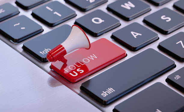 istock Red Megaphone Sitting On Follow Us Written Computer Keyboard 1437528213