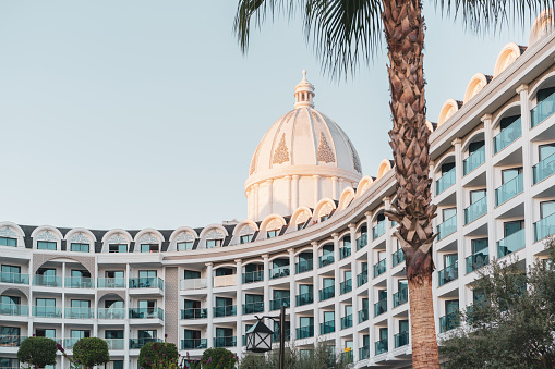 Detail of Luxury resort hotel among the palm trees