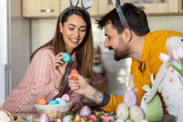 Beautiful woman goofing around with her husband on Easter
