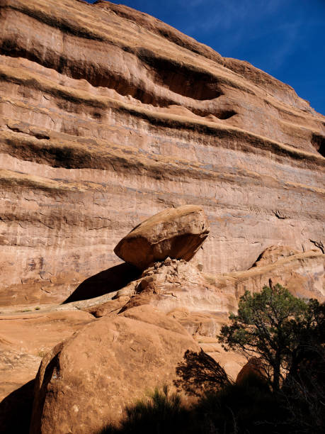 istock Large boulder precariously balanced above a narrow canyon. Arches National Park, Utah. 1437535889