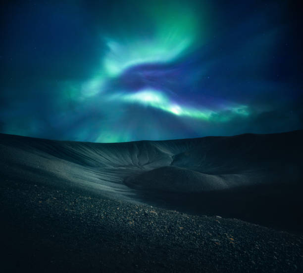 Northern Lights Above Volcanic Crater stock photo