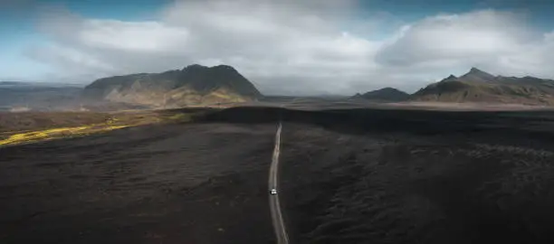 View from above on gravel road (F-road) through the Highlands of Iceland. Drone point of view.