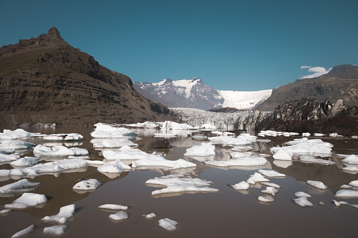 Los Glaciares National Park, Argentina - December 10, 2019: Tourists trekking on Perito Moreno Glacier in Los Glaciares National Park near El Calafate in Argentina, Patagonia, South America.